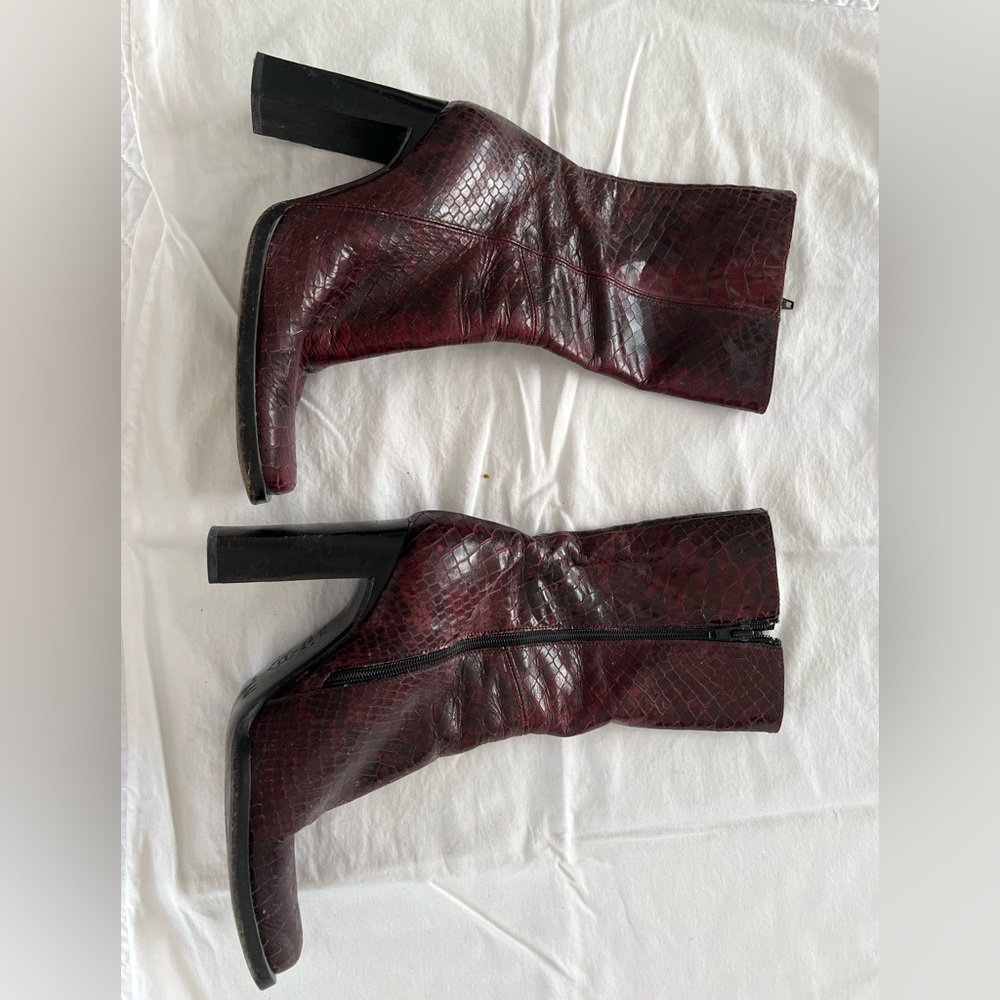 Red snake skin. Mid calf. 4 inch heel.